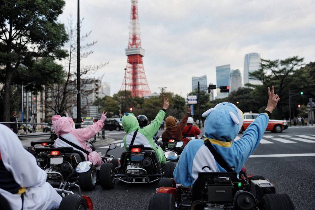 Go-kart group posed near Tokyo Tower