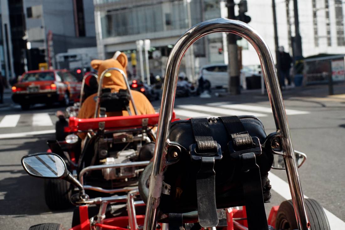 Close view of a street go-kart's belts and mirrors