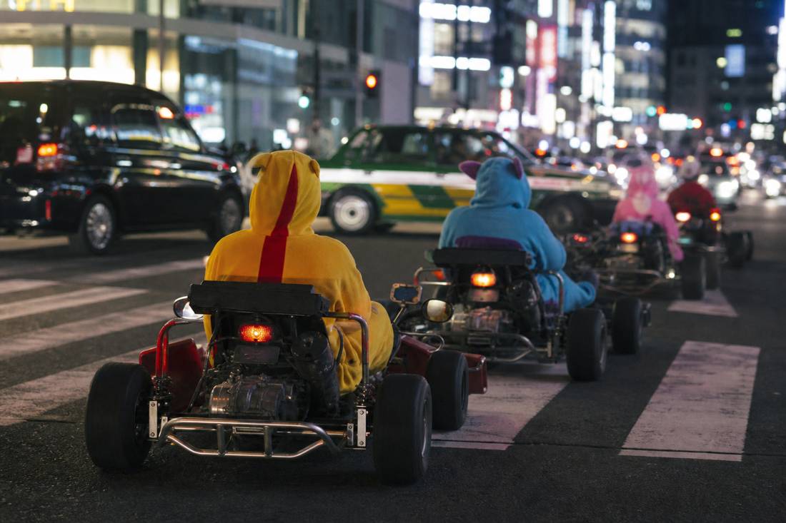 Go-karts threading through Shibuya traffic