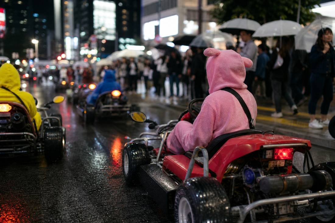 A rainy Shibuya evening with umbrellas and reflections