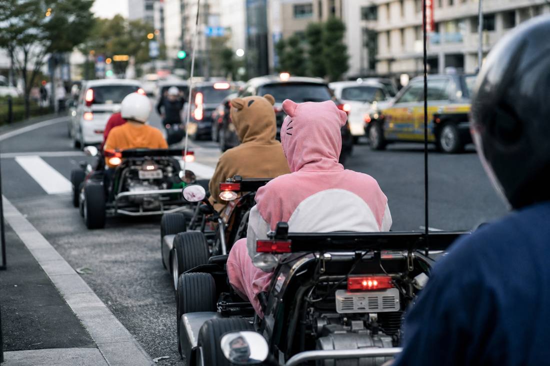 Go-karts idling at their first red light in Tokyo