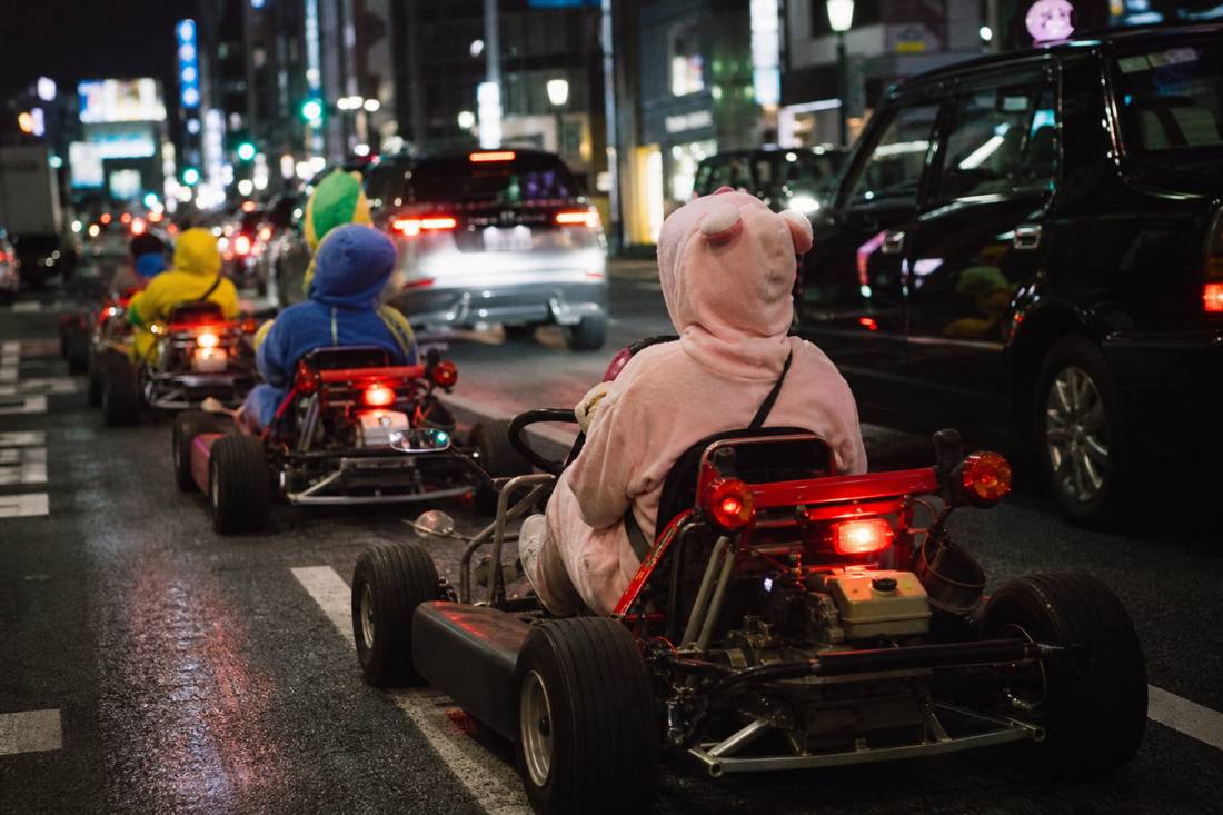 A night go-kart convoy in Tokyo neon